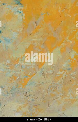 Abstract background of yellow orange textured strokes, splashes, drops of paint Stock Photo