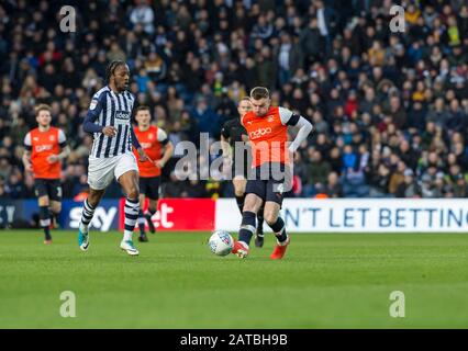 1st February 2020; The Hawthorns, West Bromwich, West Midlands, England; English Championship Football, West Bromwich Albion versus Luton Town; Ryan Tunnicliffe of Luton Town passing the ball forward - Strictly Editorial Use Only. No use with unauthorized audio, video, data, fixture lists, club/league logos or 'live' services. Online in-match use limited to 120 images, no video emulation. No use in betting, games or single club/league/player publications Stock Photo