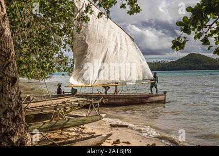 Polynesian style sailing on a Proa (multi-hull outrigger sailboat) in Deboyne Islands, Papua New Guinea