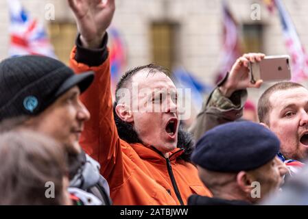 Angry Brexiteers chanting anti Europe messages at pro EU remainers on Brexit Day, 31 January 2020, in London, UK. White Caucasian male. Males Stock Photo