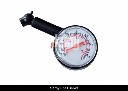 The Black manometer with red arrow for measurement of the pressure in bus. Instrument insulated on white background Stock Photo