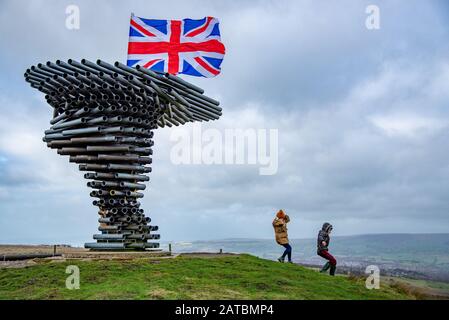 Burnley, Lancashire, UK. 1st Feb, 2020. A very windy day and a flag placed to celebrate Brexit on Burnley's Panopticon, 'Singing Ringing Tree', a unique musical sculpture which overlooks Burnley in Lancashire. In June 2007, Singing Ringing Tree was named winner of a National Award for architectural excellence by the Royal Institute of British Architects. Credit: John Eveson/Alamy Live News Stock Photo