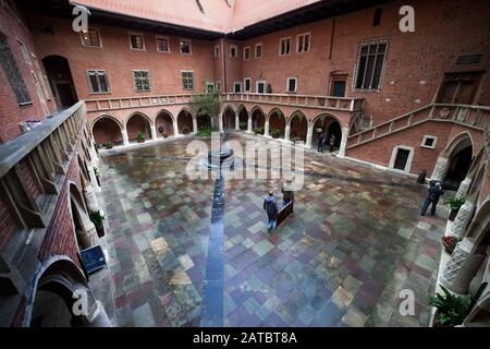 Krakow, Poland - September 24, 2018: Collegium Maius arcade courtyard, oldest building of Jagiellonian University, 15th century Gothic city landmark Stock Photo