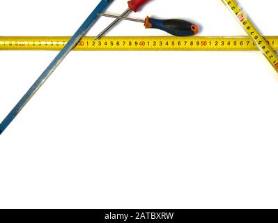 Screwdrivers and saw.Construction and repair tools Stock Photo