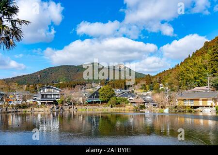 Golden Scale Lake and Yufu Mountain in winter sunny day with clear blue sky. This popular sightseeing spot commonly viewed and photographed by tourist Stock Photo
