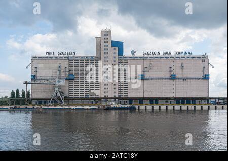 Ship port Szczecin on river Odra. Bulk cargo terminal. Poland. 08-28-2017. Stock Photo