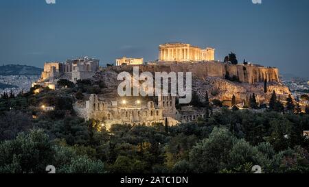 Night panoramic view of Acropolis, Athens, Greece. Famous Acropolis hill is the main landmark of Athens. Beautiful scenery of old Athens in evening. A Stock Photo