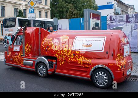 Berlin Currywurst Museum promotion truck at Checkpoint Charlie in Berlin. Stock Photo