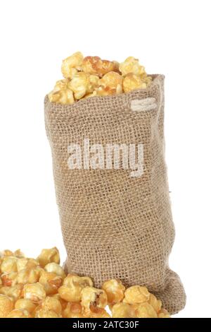 Caramelized popcorn on table Stock Photo