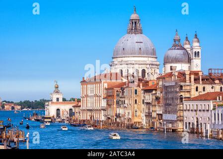 Grand Canal, Venice, Italy. It is one of the main landmarks of Venice. Nice panorama of the major street of Venice with Basilica of Santa Maria Salute Stock Photo
