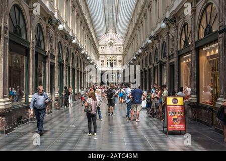 Brussels Old Town / Belgium - 06 25 2019: People in summer clothes walking through the  Saint Hubertus Gallery in Art Nouveau style Stock Photo