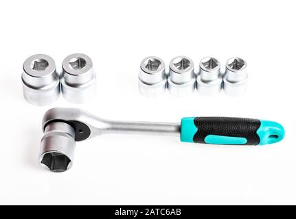 Ratchet wrench. Steel made no skid threaded handle hold firmly without slipping. Ratchet tool. Universal socket sets. Can be used in hard to reach places. Knob for socket wrench nut ratchet close up. Stock Photo