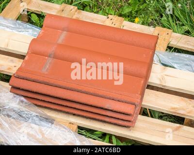 New roof tiles on a building site Stock Photo
