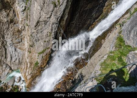 The Simmswasserfall, an adventure via ferrata near Holzgau in Austria along a waterfall Stock Photo