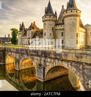 The chateau of Sully-sur-Loire at suset, France. This castle is located in the Loire Valley, dates from the 14th century and is a prime example of med Stock Photo