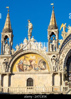 Facade detail of the San Marcos Basilica with mosaic with scenes from the life of Christ, Venice Stock Photo