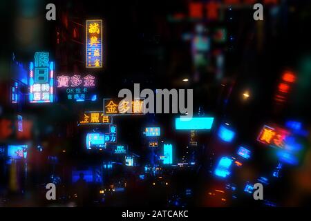 Neon lights and shop signs in Hong Kong streets at night Stock Photo