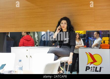 KYIV, UKRAINE - APRIL 06, 2019: People visit Pelican Products booth, a company that manufactures temperature controlled packaging and protective cases Stock Photo