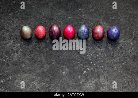 Marbled Easter eggs on black background Stock Photo