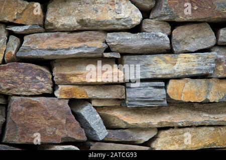 Background of a wall of big natural stones Stock Photo