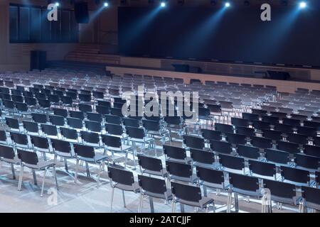 Empty conference hall. Hall for business meeting. Interior of a congress hall. Empty conference room in the hotel ready for participants. Equipped conference hall. Indoor business conference Stock Photo