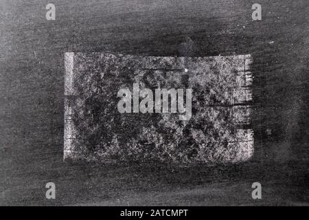 Grunge white chalk art brush in square line shape on black board background. Decoration and design element Stock Photo