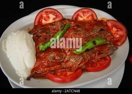 Turkish Iskender Kebab in dinner plate Stock Photo