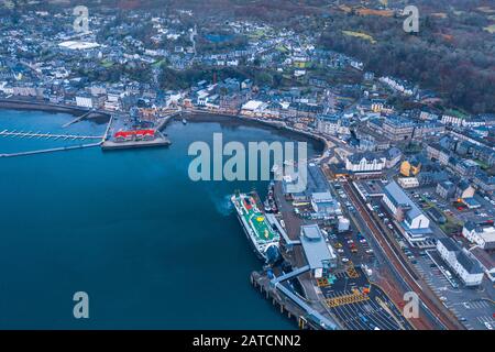 High altitude drone shoot over scenic harbour with ferry terminal of Oban in Scotland Stock Photo