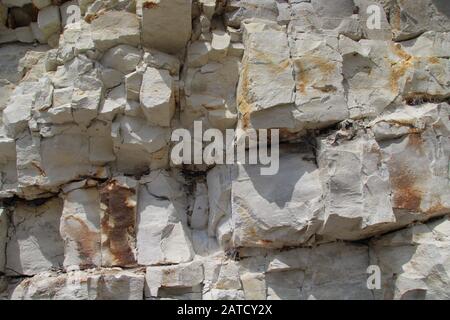 Closeup shot of a limestone wall with cuboidal pattern in Arnager, Bornholm Stock Photo