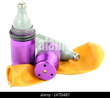 Nitrous oxide legal high equipment including canisters and balloon isolated on a white background Stock Photo