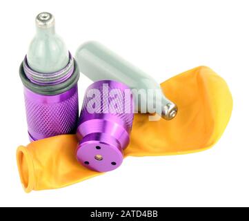 Nitrous oxide legal high equipment including canisters and balloon isolated on a white background Stock Photo