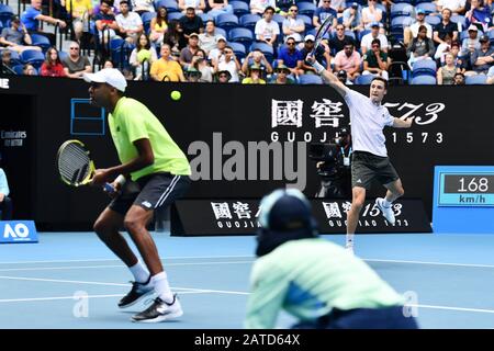 Melbourne, Australia. 2nd Feb, 2020. Joe Salisbury (R) of Britain/Rajeev Ram of the United States compete during the Men's Doubles final against Max Purcell/Luke Saville of Australia at 2020 Australian Open in Melbourne, Australia on Feb. 2, 2020. Credit: Bai Xue/Xinhua/Alamy Live News Stock Photo