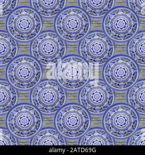 Seamless background from a set of decorative ceramic dishes hand-painted with acrylic paints with a floral pattern. Stock Photo