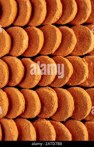 Frozen hamburger patties stacked in rows, top view. Stock Photo