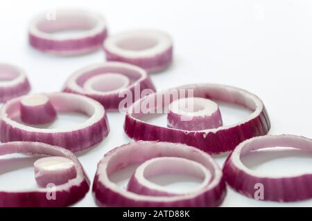 Sliced red onion rings isolated on white background cutout Stock Photo