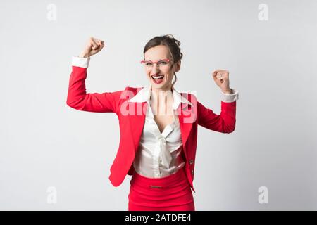 Businesswoman celebrating a success Stock Photo
