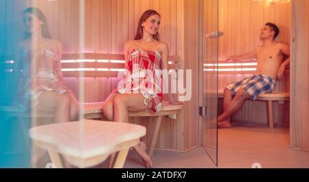 Woman and man in the sauna Stock Photo
