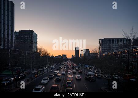 Beijing, China - December 25 2018: Heavy traffic in a street in Beijing that produce a lot of air pollution. Stock Photo