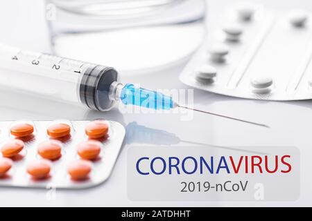 Coronavirus 2019-nCoV. Novel coronavirus, Middle East Respiratory Syndrome. Pills with CORONAVIRUS text. Chinese coronavirus outbreak. Virus Pandemic Stock Photo