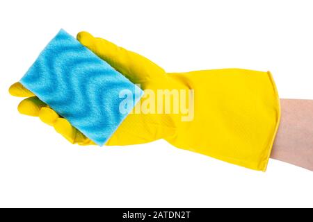 hand in a yellow household glove with a washcloth. isolated on a white background. file contains clipping path Stock Photo