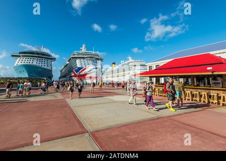 Philipsburg, St. Maarten - December 17, 2018: Passengers stream on and off the cruise ships berthed in Philipsburg Sint Maarten Cruise Port Terminal, Stock Photo