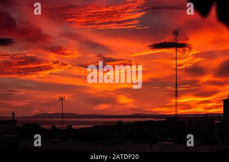 a blood red sunset taken from Marbella of the Andalucia coast Stock Photo