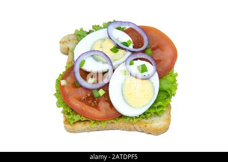 Sandwich with lettuce, eggs, tomatoes and purple onions. Isolated on a white background Stock Photo