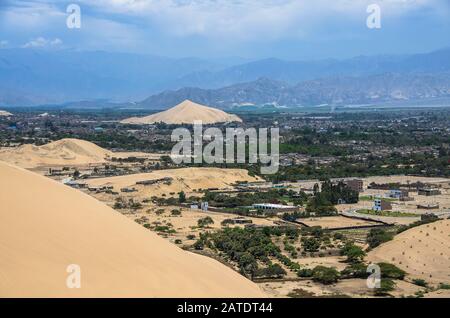 Hucachina oasis and sand dunes near Ica, Peru Stock Photo