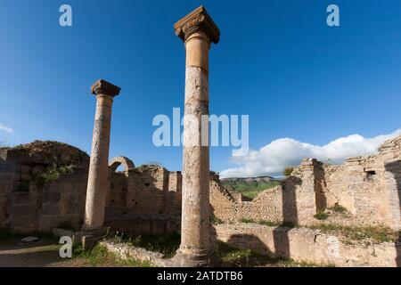 Remains of the village of Cuicul at the Ancient Roman ruins of Djemilla, A UNESCO World Heritage site in Northern Algeria. Stock Photo