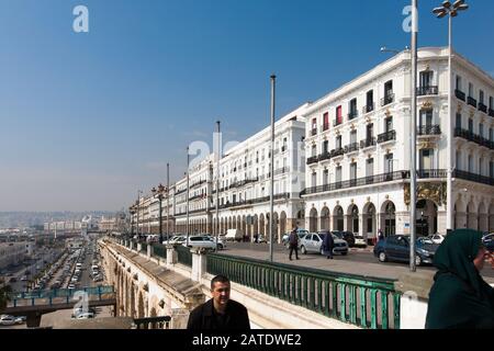 The Algiers waterfront or Promenade des Sablettes is an iconic view that climbs into the famous casbah behind it. Algiers, Algeria. Stock Photo