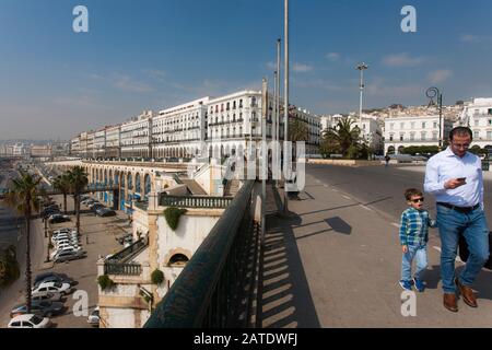 The Algiers waterfront or Promenade des Sablettes is an iconic view that climbs into the famous casbah behind it. Algiers, Algeria. Stock Photo