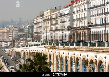 The Algiers waterfront or Promenade des Sablettes is an iconic view that climbs into the famous casbah behind it. Algiers, Algeria. Stock Photo