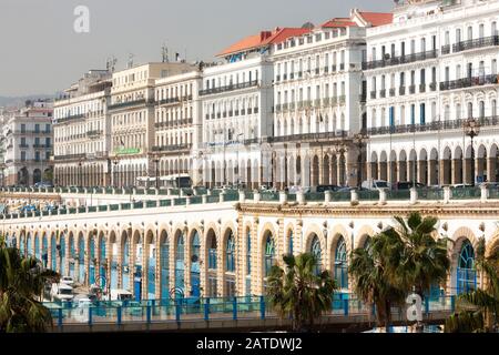 The Algiers waterfront or Promenade des Sablettes is an iconic view that climbs into the famous casbah behind it. Algiers, Algeria. Stock Photo