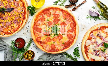 traditional-pizza-paperoni-top-view-free-space-for-your-text-rustic